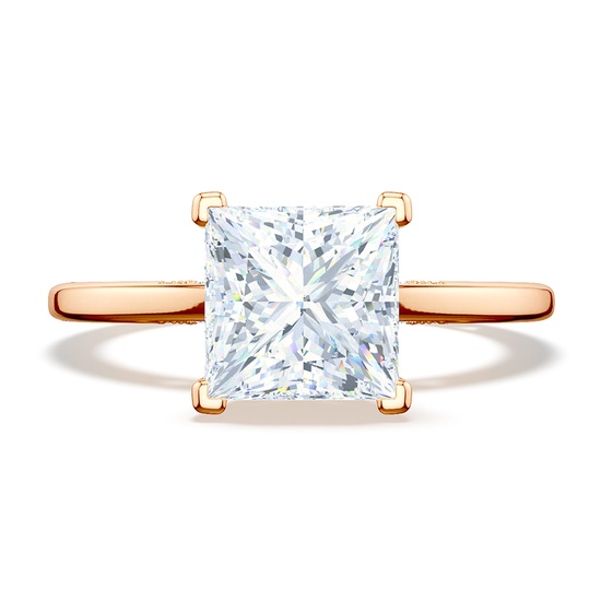 A radiant princess cut solitaire ring with a rose gold band from TACORI.