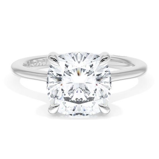 A sparkling cushion-cut solitaire diamond ring.