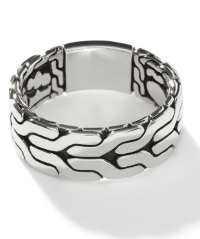A sterling silver carved chain ring.