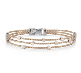 A rose gold and stainless steel interwoven chain bracelet, accented with round diamonds.
