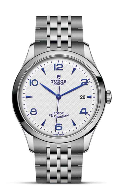 A stainless steel TUDOR watch with white dial and blue arab numerals.