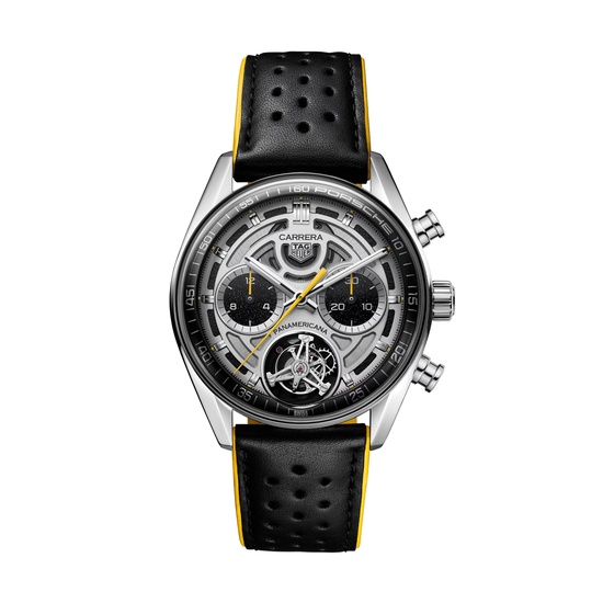 A TAG Heuer watch with a black leather perforated strap, silver skeleton dial, and intricate gears.