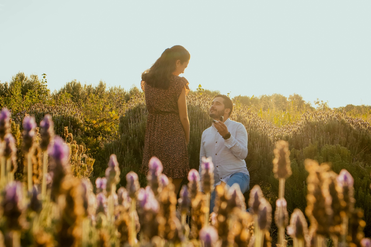 A man proposing while on a walk at the O’Neill Regional Park