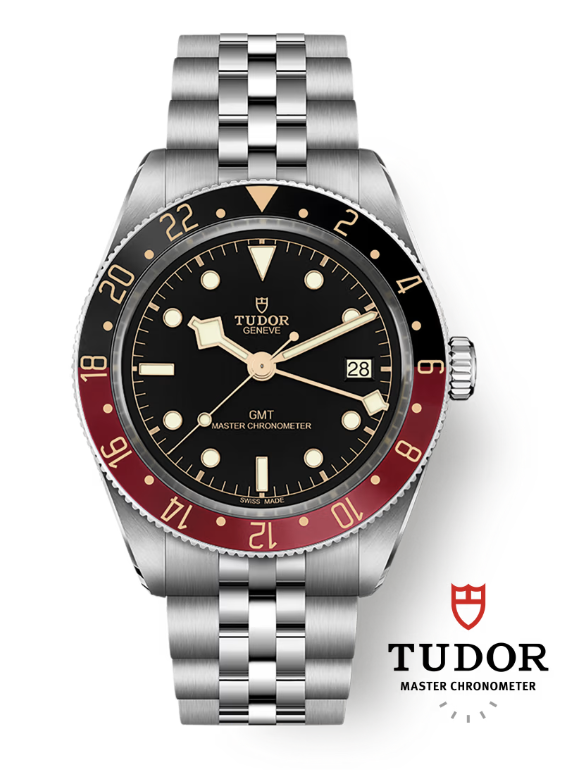 A TUDOR watch with black dial, metallic bracelet, and half black half burgundy rotating bezel
