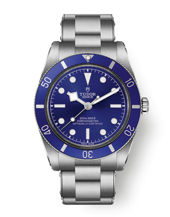 A TUDOR watch with steel bracelet, deep blue dial and rotating bezel.